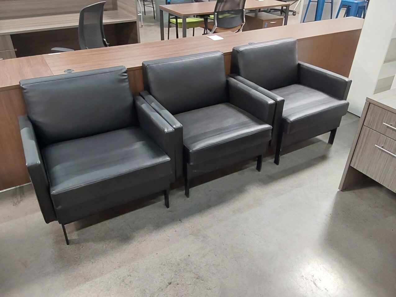 Preowned Black leather club chair